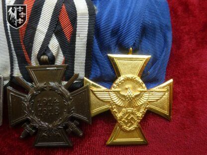 Barrette 3 médailles : croix de fer 2e classe, Ehrenkreuz et médaille Police 25 ans de service. militaria allemand