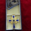 Croix des Mères Or avec sa boite